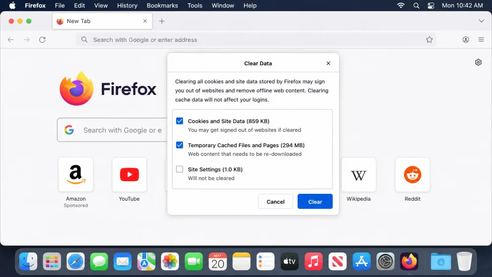The Firefox Clear Data dialog open on a Mac with the Cookies and Site Data and Temporary cached files and pages checkboxes selected and the Clear button highlighted.