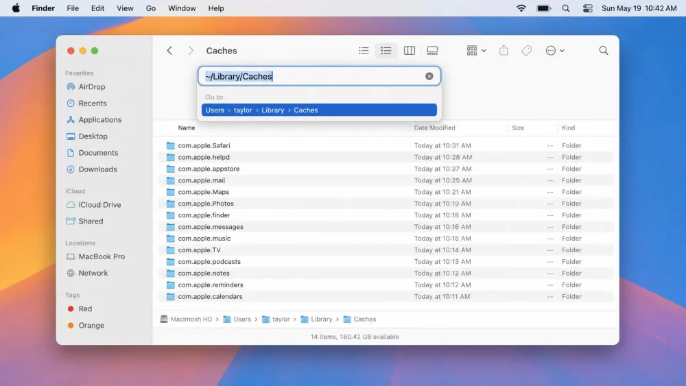 A Finder window on a Mac showing the ~/Library/Caches folder open with a list of app-named cache subfolders, and the Go to Folder bar visible at the top.