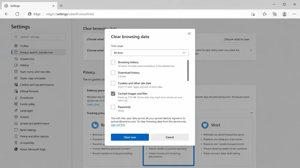 The Microsoft Edge Clear browsing data dialog on Windows, with Time range set to All time, Cached images and files ticked, and the Clear now button highlighted.