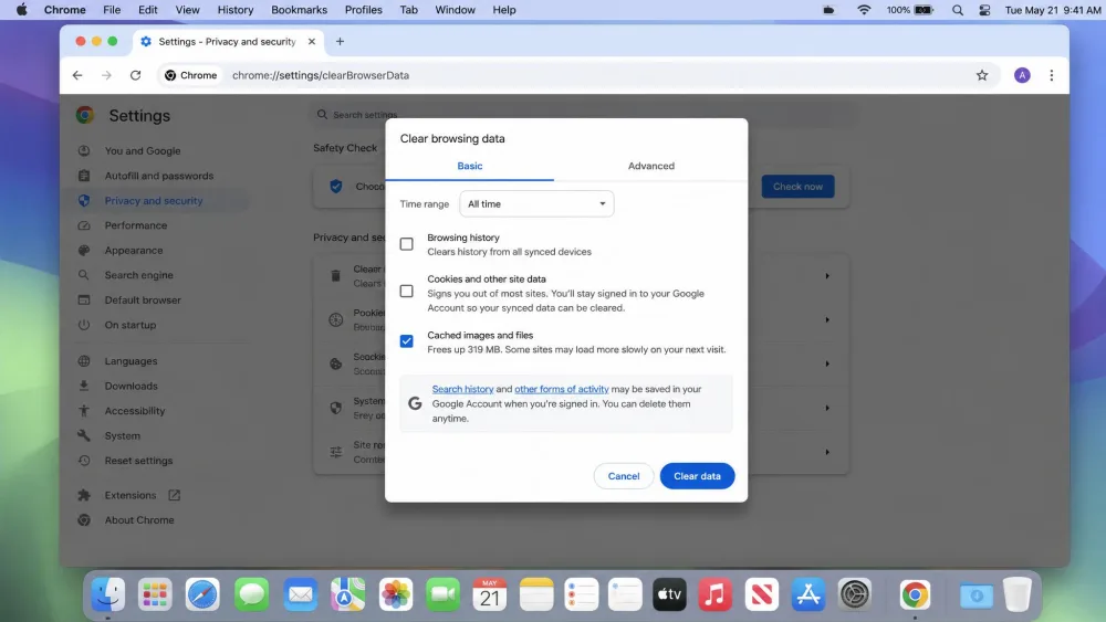 Chrome's Clear browsing data dialog on a MacBook with Cached images and files checked and the time range set to All time.