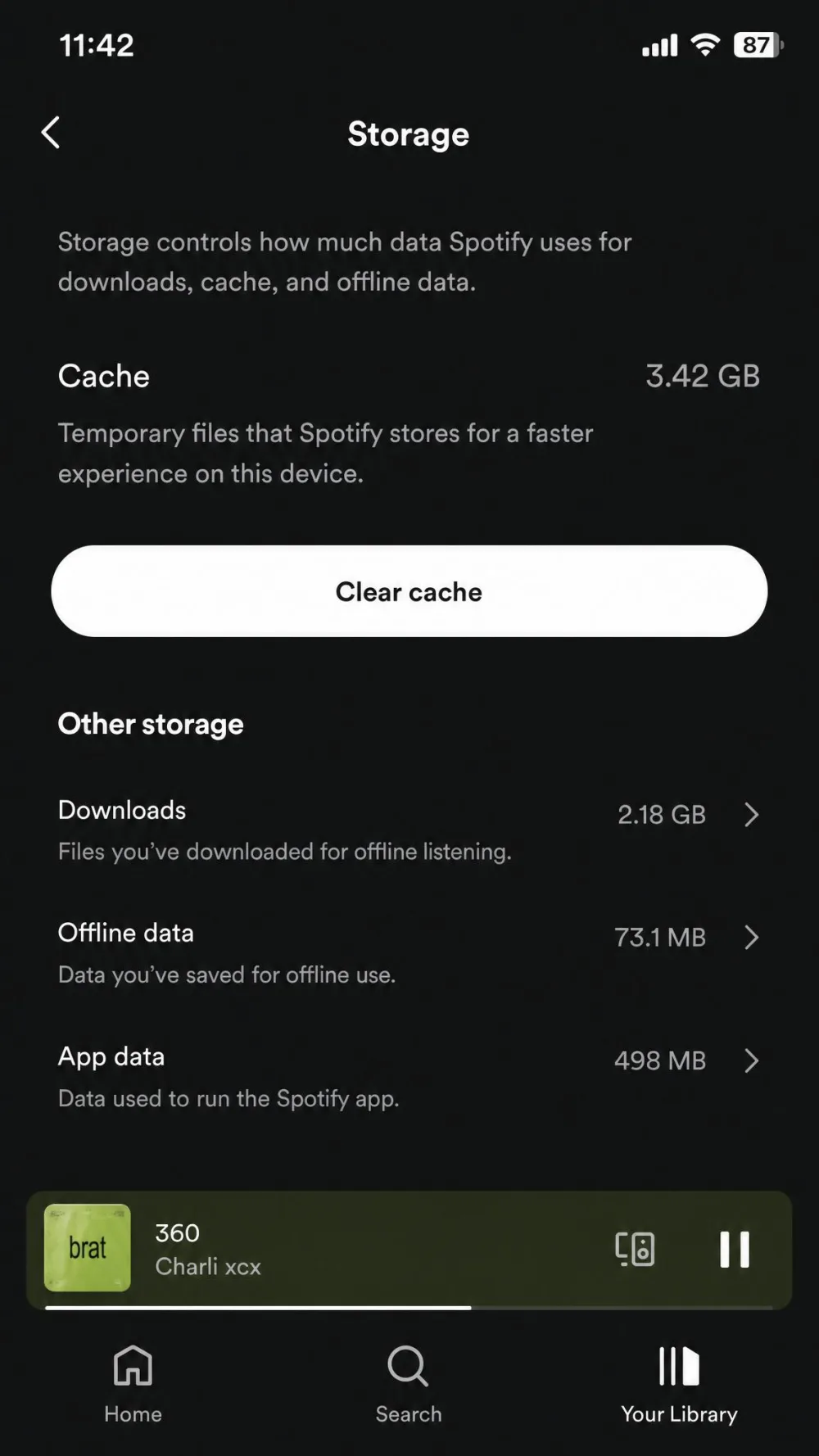 The Spotify mobile Storage settings screen showing the cache size at several gigabytes, with the Clear cache button below it.