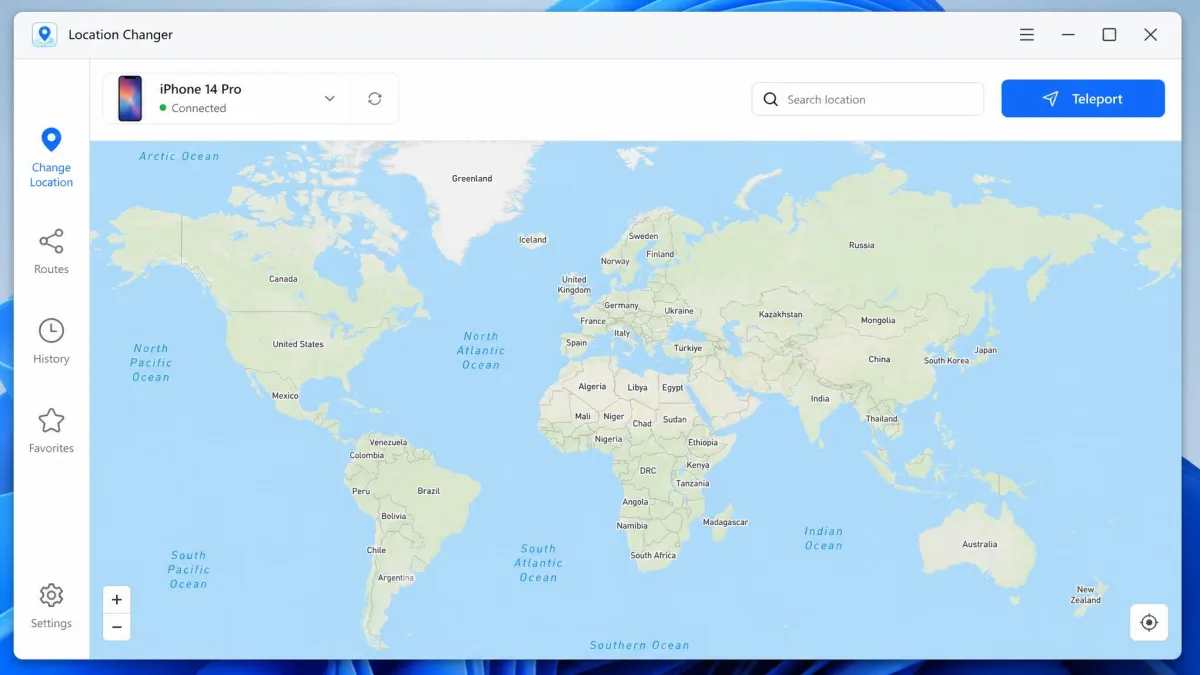 A desktop location changer window on Windows showing a connected iPhone in the device bar and a world map with a search field and a teleport button in the top right corner.