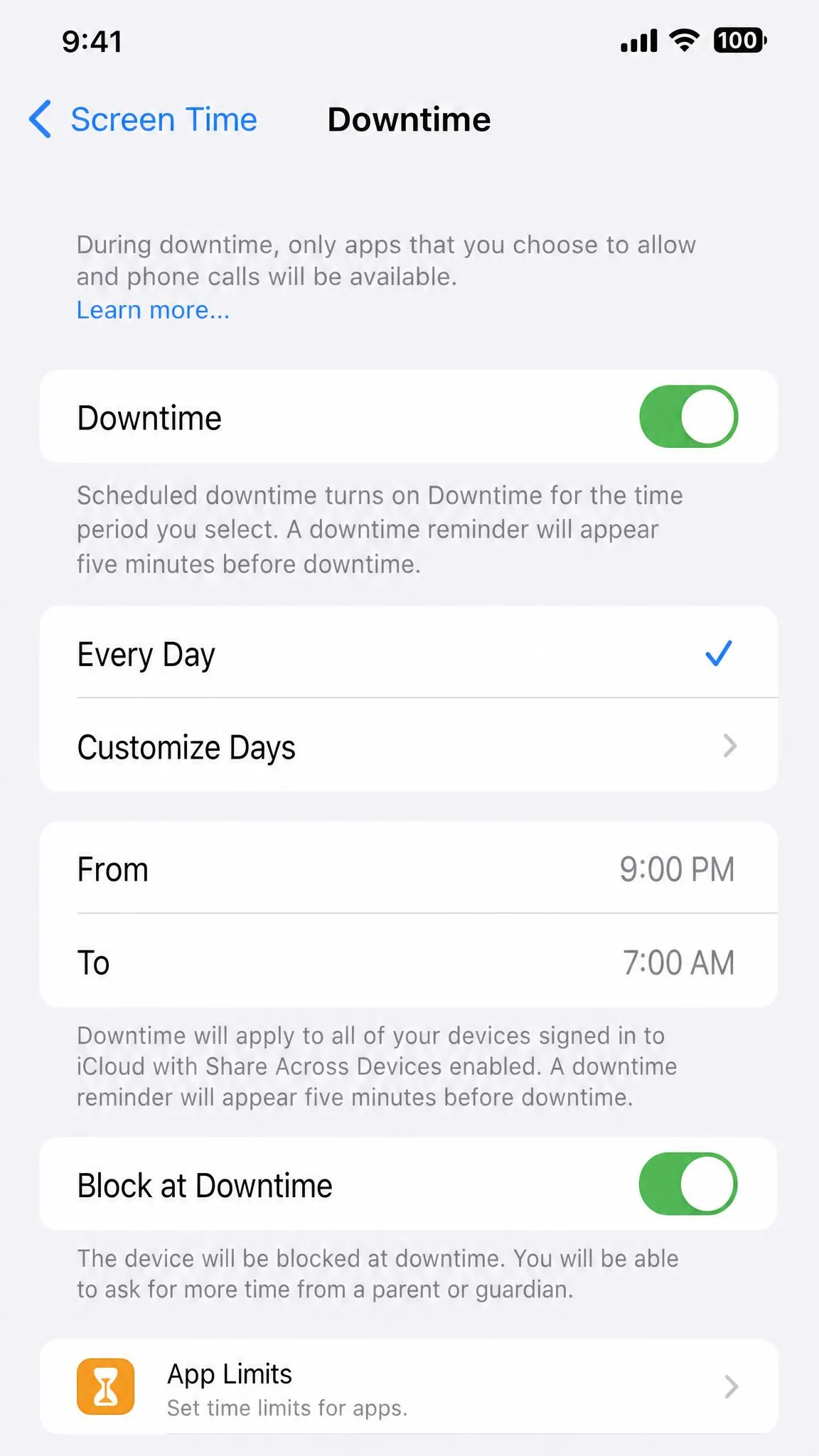 The iPhone Screen Time settings screen showing Downtime scheduled from 9 PM to 7 AM with Block at Downtime enabled, above an App Limits row.