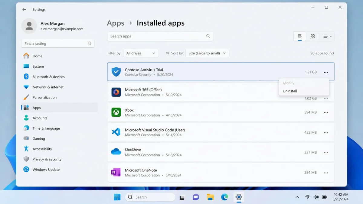 The Windows 11 Settings app showing Installed apps sorted by size, with a preinstalled trial antivirus highlighted and its uninstall menu open.