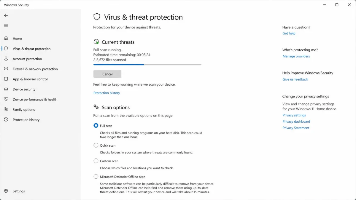 The Windows Security virus and threat protection screen mid full scan, with the scanned item count rising and scan options visible below.