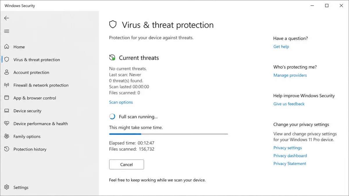 The Windows Security virus and threat protection screen with a full scan running, showing elapsed time and the count of files scanned so far.