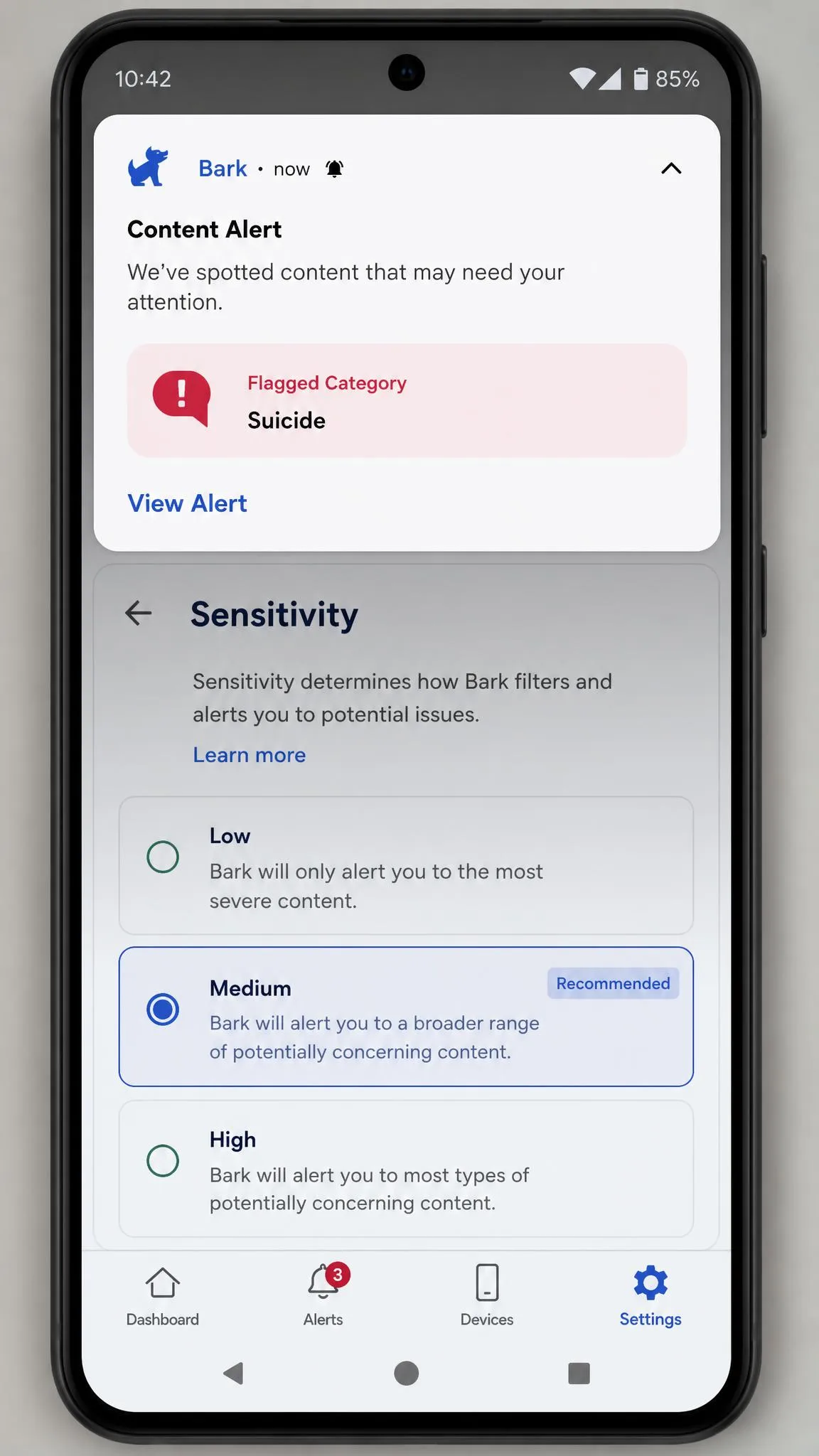 A Bark content alert notification on an Android parent phone, showing a flagged message category and a sensitivity setting screen behind it.