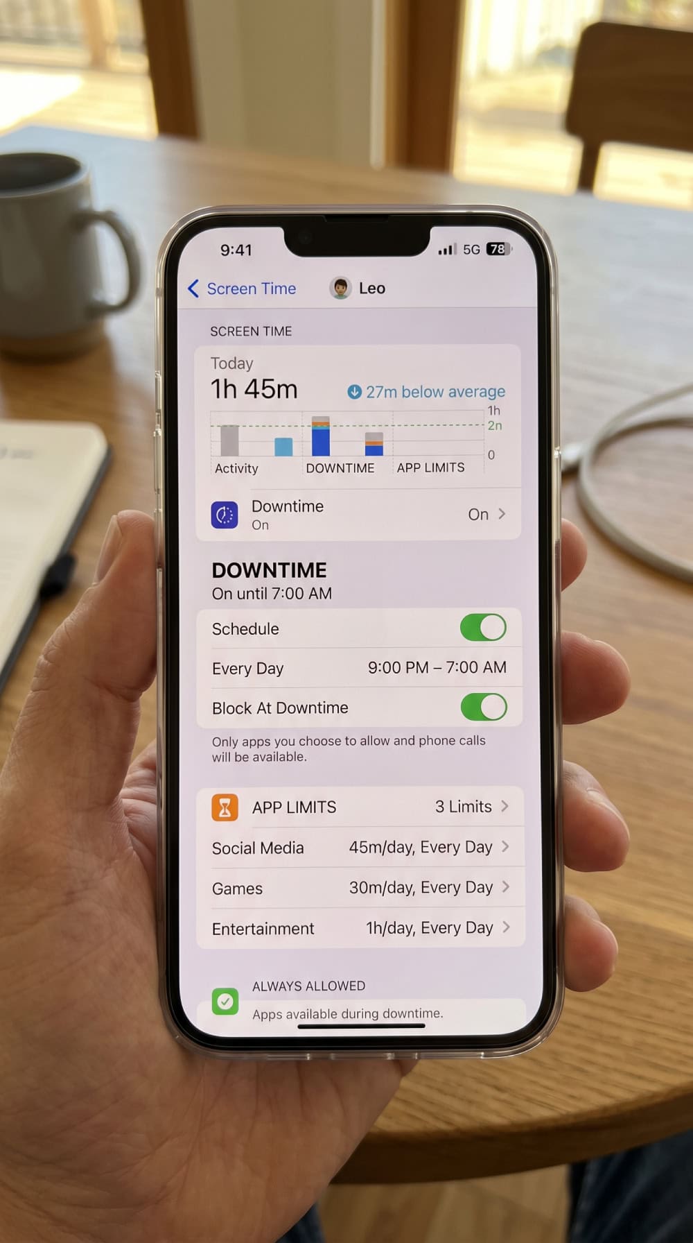Apple Screen Time settings on an iPhone showing Downtime and App Limits controls for a child's device.