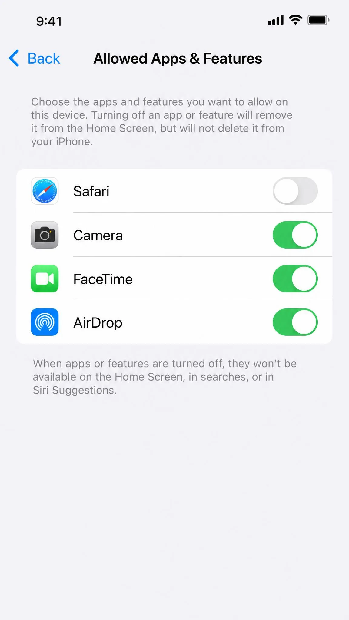 The Allowed Apps & Features screen on an iPhone showing Safari, Camera, FaceTime and AirDrop toggles, with Safari switched off.