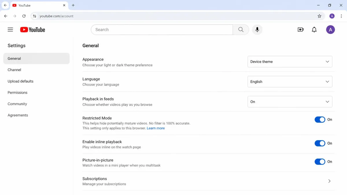 YouTube desktop browser Settings page with the General tab open and Restricted Mode toggled On.