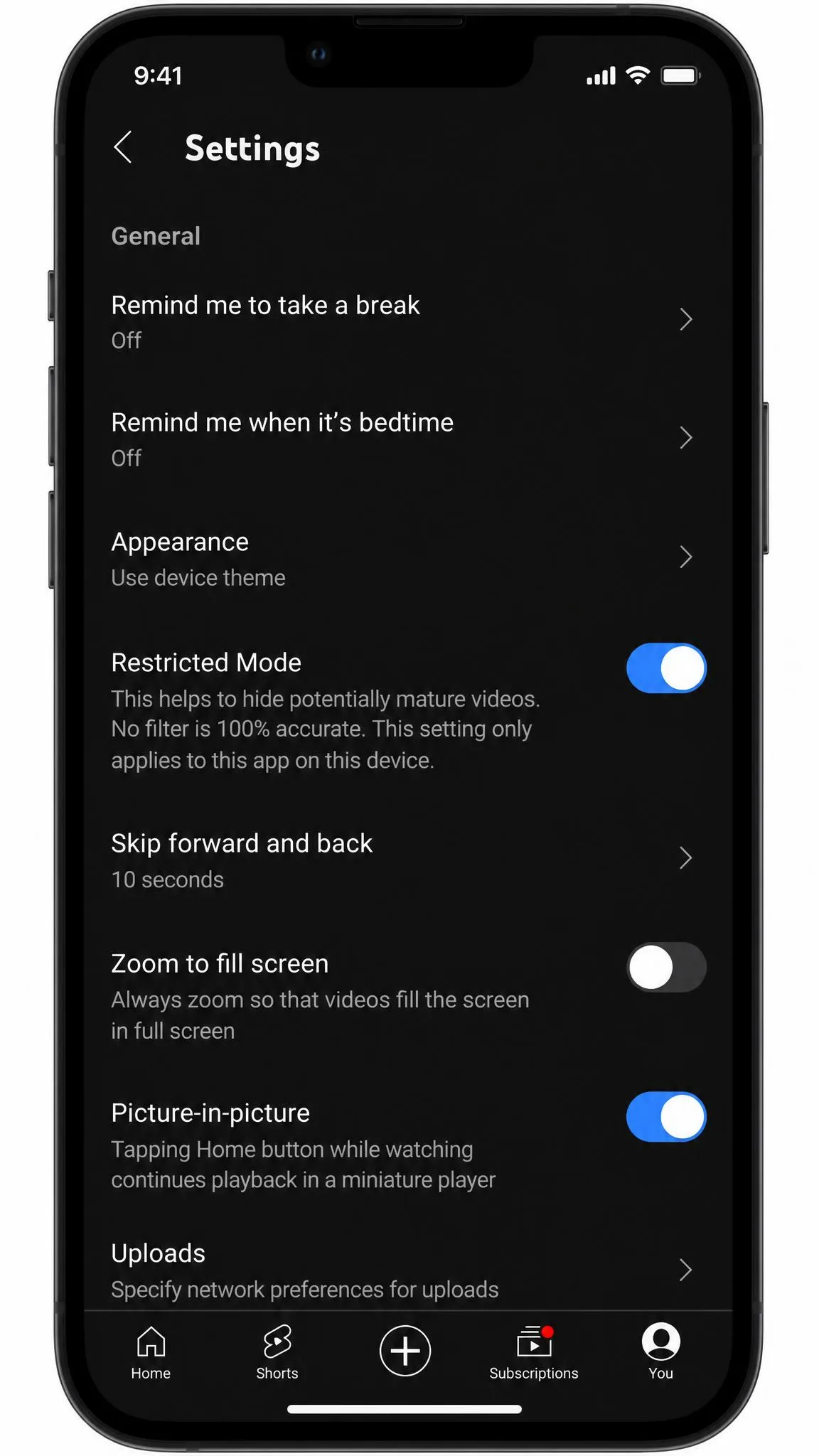 YouTube app Settings screen on an iPhone showing the Restricted Mode toggle in the General section.