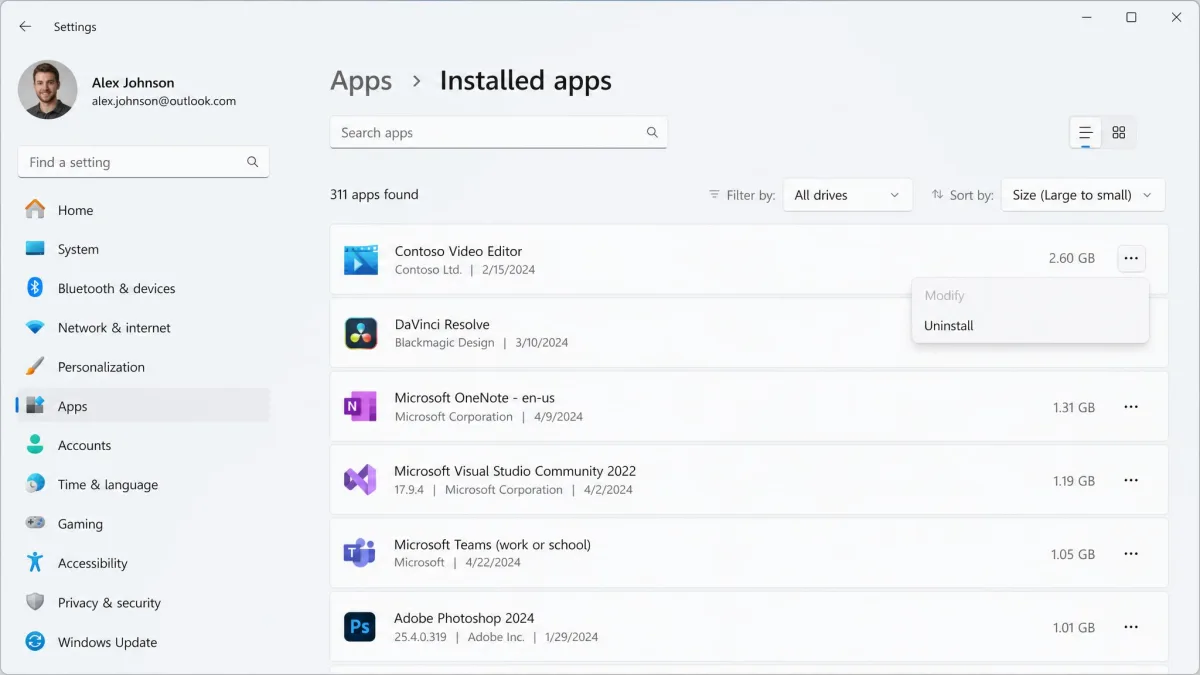 The Installed apps page in Windows 11 Settings sorted by size, with a large unused video editor at the top and its three-dot Uninstall menu open.