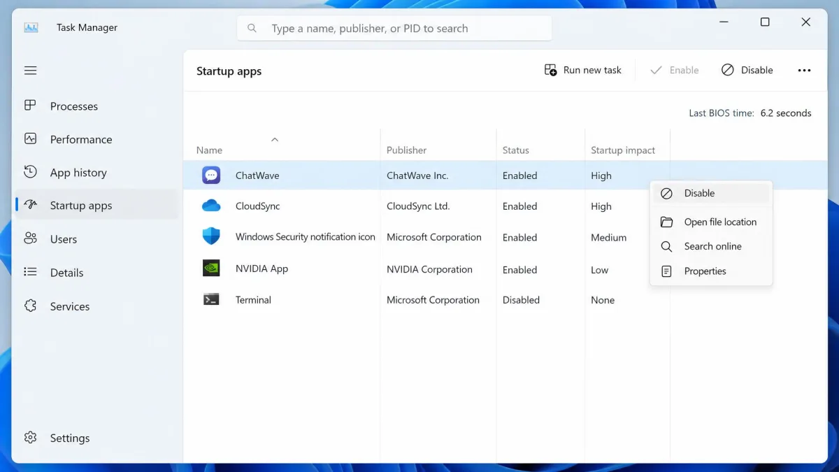 The Startup apps tab in Windows 11 Task Manager listing a chat client and a cloud sync tool rated High impact, with the right-click Disable option open.
