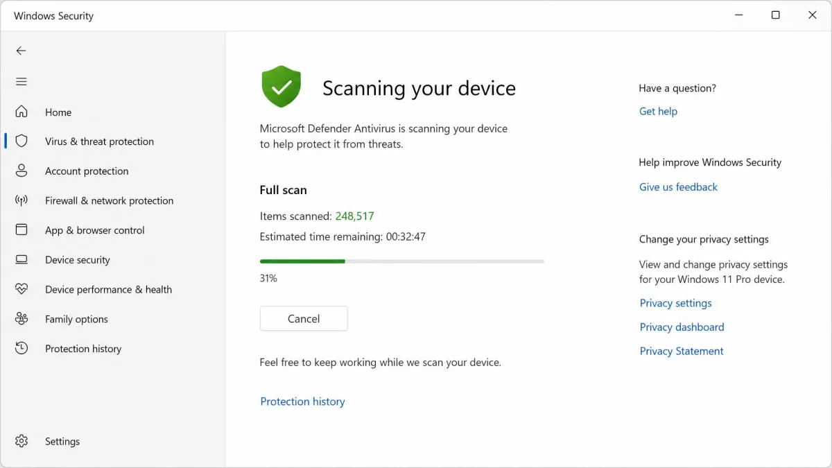 Windows Security running a full Defender scan, showing the item count climbing and the estimated time remaining beneath a green shield icon.