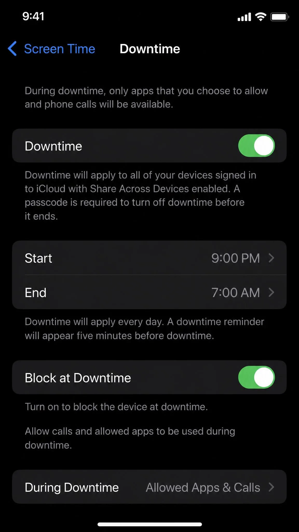 The iPhone Screen Time Downtime screen with start and end times set for 9 PM to 7 AM and the Block at Downtime toggle switched on.