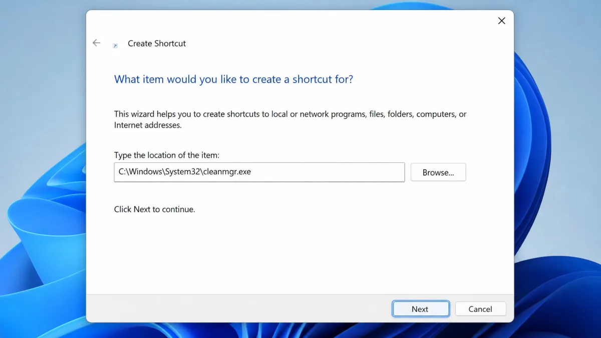 The Create Shortcut wizard in Windows with the full path C:\Windows\System32\cleanmgr.exe typed into the location field and the Next button highlighted.
