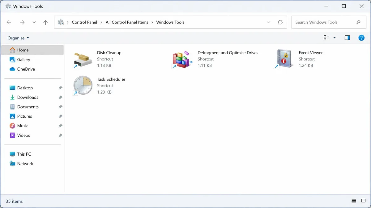 The Windows Tools folder in Windows 11 Control Panel, showing the Disk Cleanup shortcut alongside Defragment and Optimise Drives, Event Viewer and Task Scheduler.