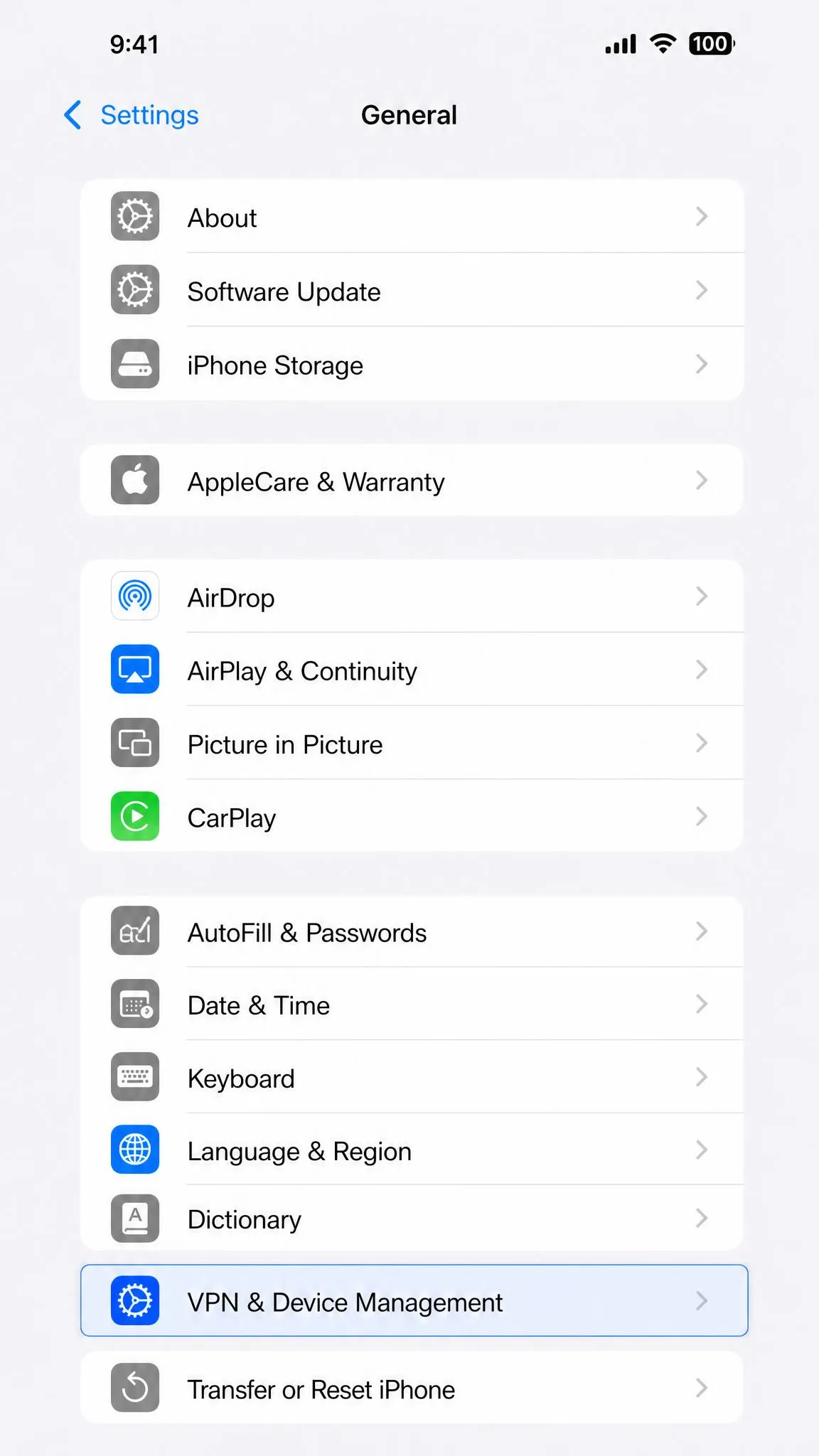 The iPhone General settings screen with the VPN & Device Management row highlighted, where both app-added and manual VPN profiles are managed.