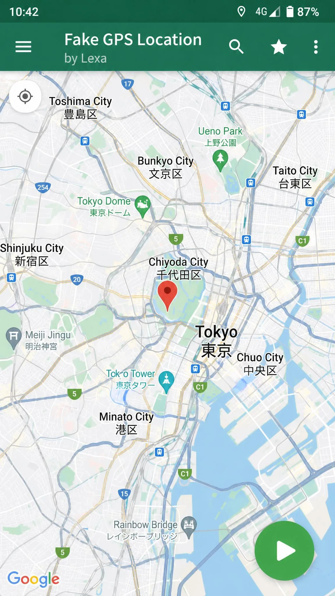 Fake GPS Location by Lexa showing a map with a pin dropped on central Tokyo and the green play button in the corner ready to start spoofing.