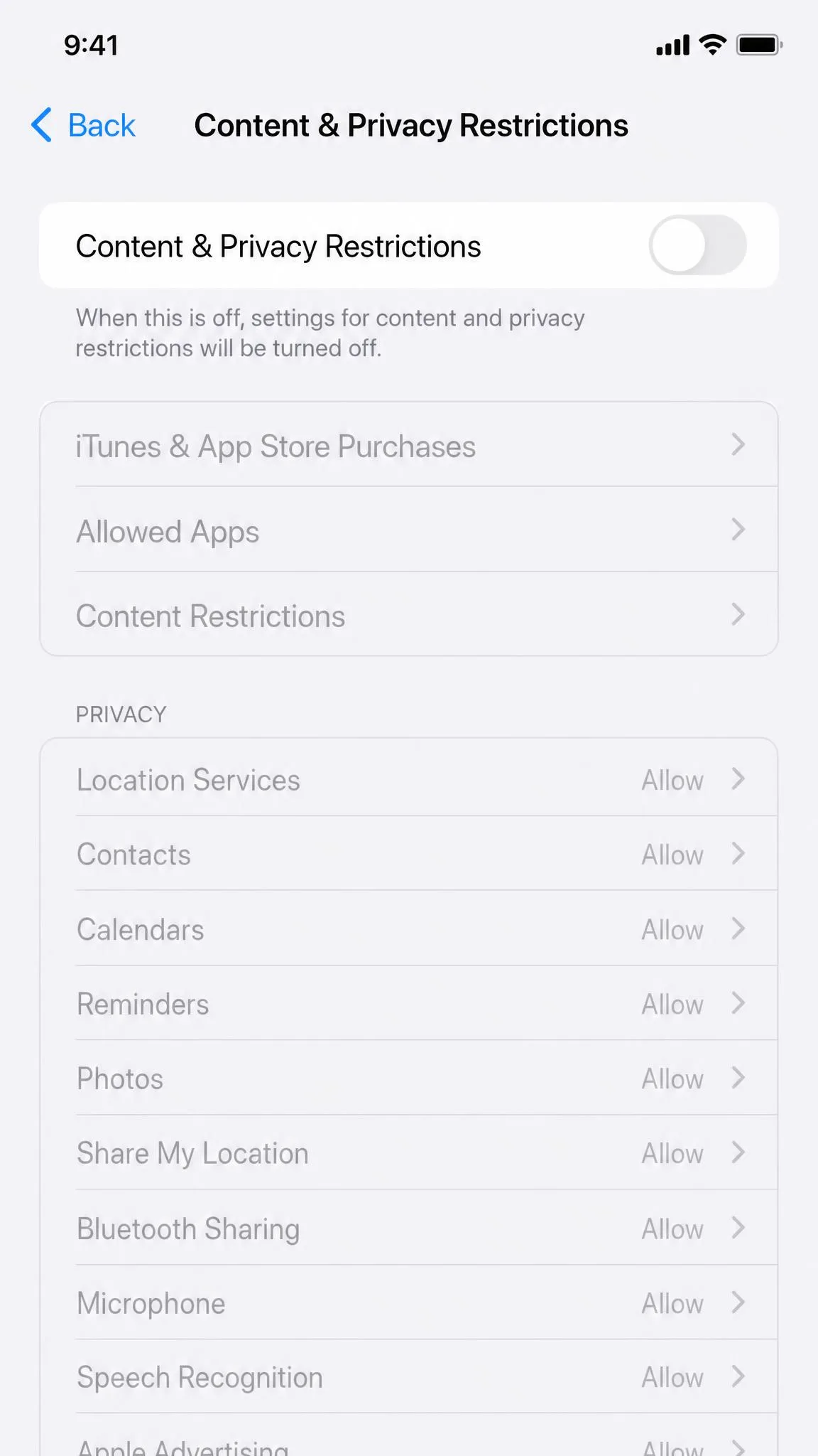 The Content & Privacy Restrictions screen on an iPhone with the master toggle switched off and the sub-setting rows grayed out beneath it.