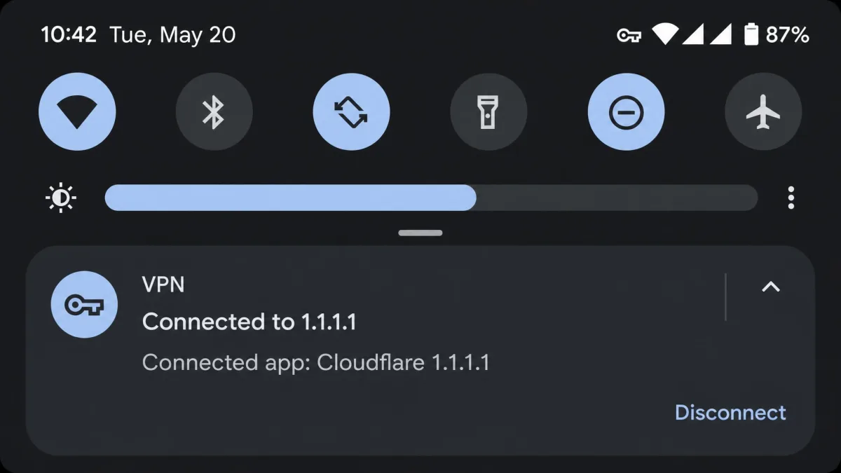 Android Quick Settings pulled down, showing the key icon in the status bar and a VPN panel naming the connected app.