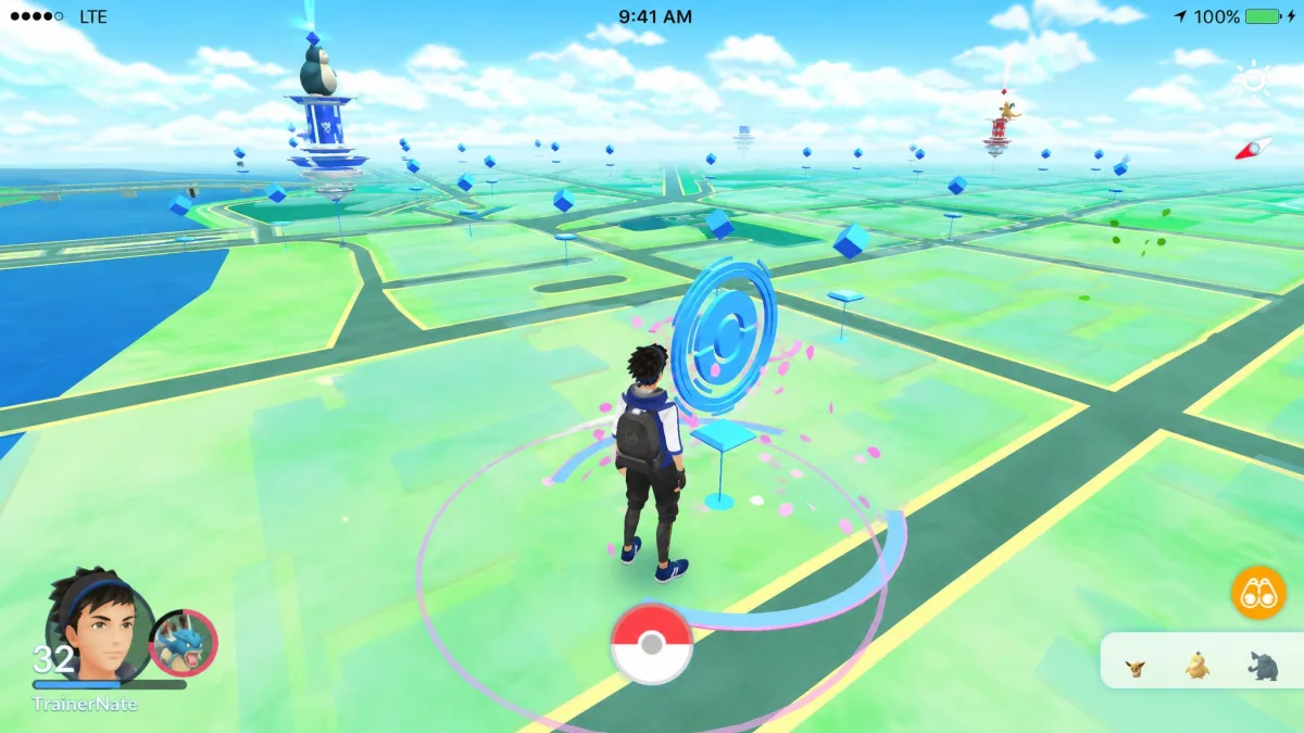 Pokémon GO map view with a player avatar standing at a PokéStop, the game most people spoof a location changer for.