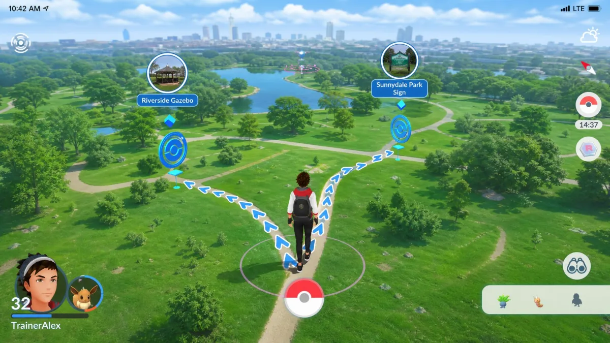 Pokémon GO gameplay with a simulated walking route drawn through a park between PokeStops.
