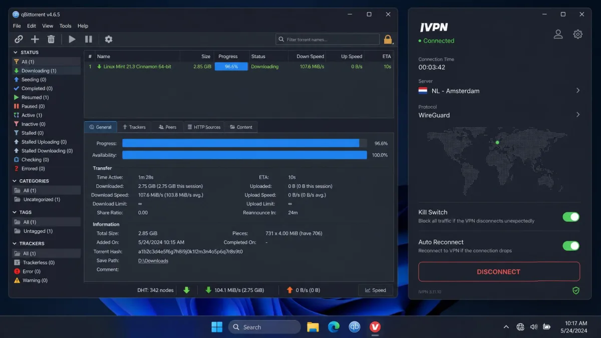 A torrent client downloading at near full speed while connected to a non-US IVPN server, with the kill switch enabled in the IVPN app beside it.