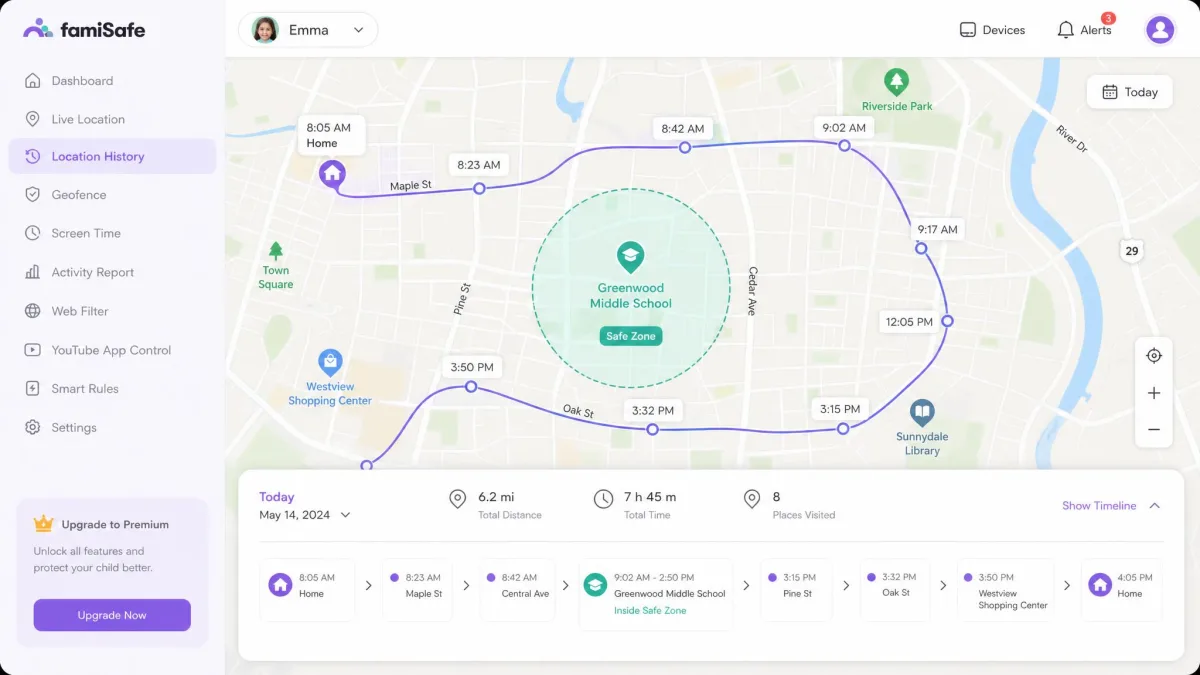 FamiSafe parent app map view showing a child's location history trail across a town with a circular geofenced safe zone drawn around a school.
