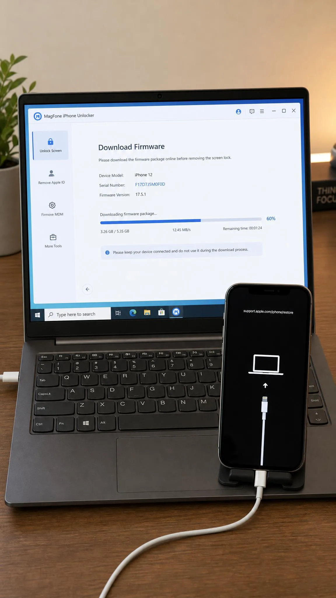 An iPhone in Recovery Mode connected to a Windows laptop running MagFone iPhone Unlocker, with the firmware download progress bar around 60 percent and the device serial number shown on screen.