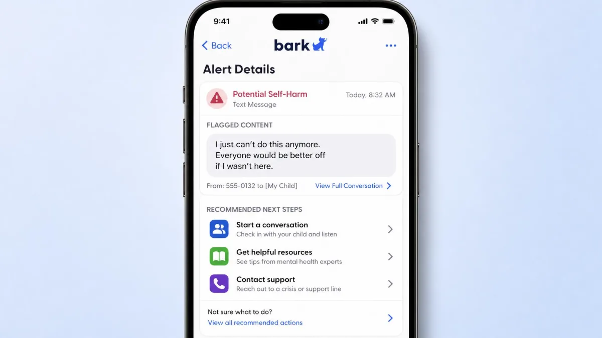 Bark's parent app open on a phone showing an alert detail screen with a flagged text message excerpt, the alert category label and the recommended next steps.