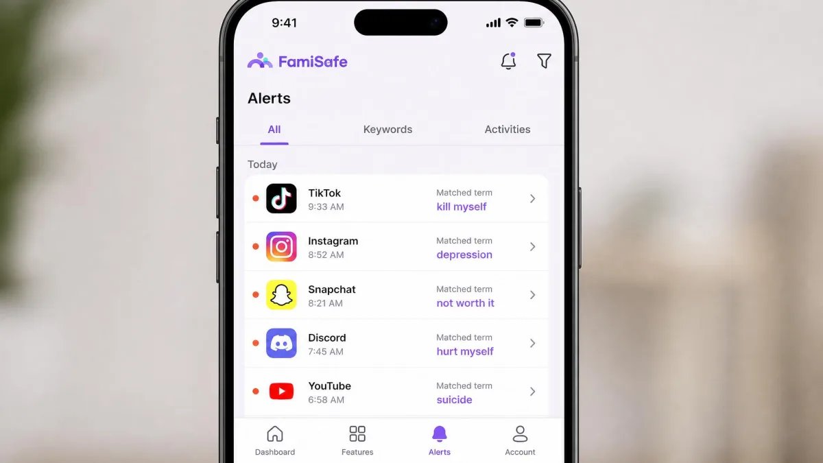 FamiSafe's alerts feed on a parent's phone listing flagged keyword matches from social apps, each entry showing the app name, time and matched term.