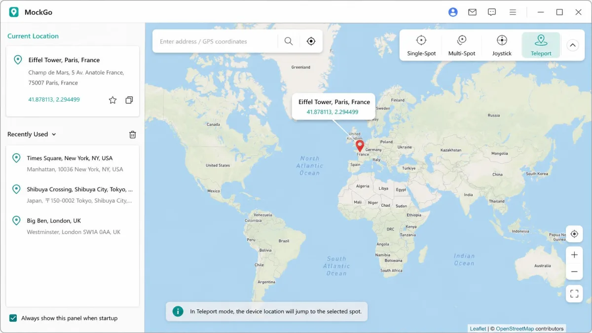 MockGo's Windows desktop app showing a world map with a dropped pin over a city and the Teleport mode button selected above it.