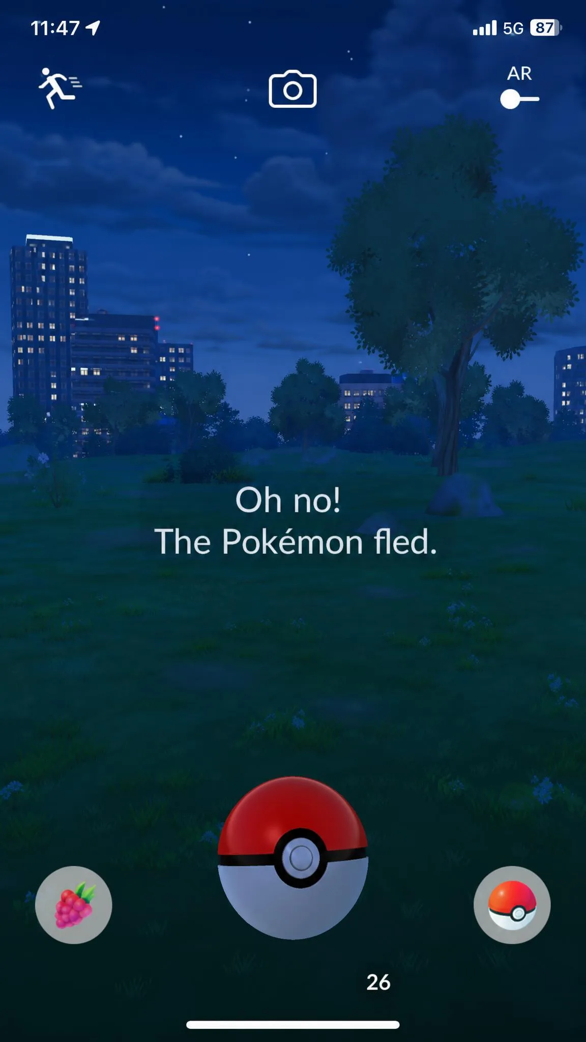 A phone screen showing a Pokemon GO encounter where the creature has fled, illustrating the soft ban behaviour that follows an unrealistic location jump.