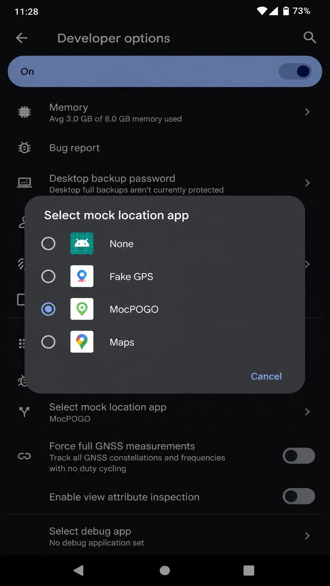 Android Developer options screen with the select mock location app entry open and MocPOGO chosen from the list of installed apps.