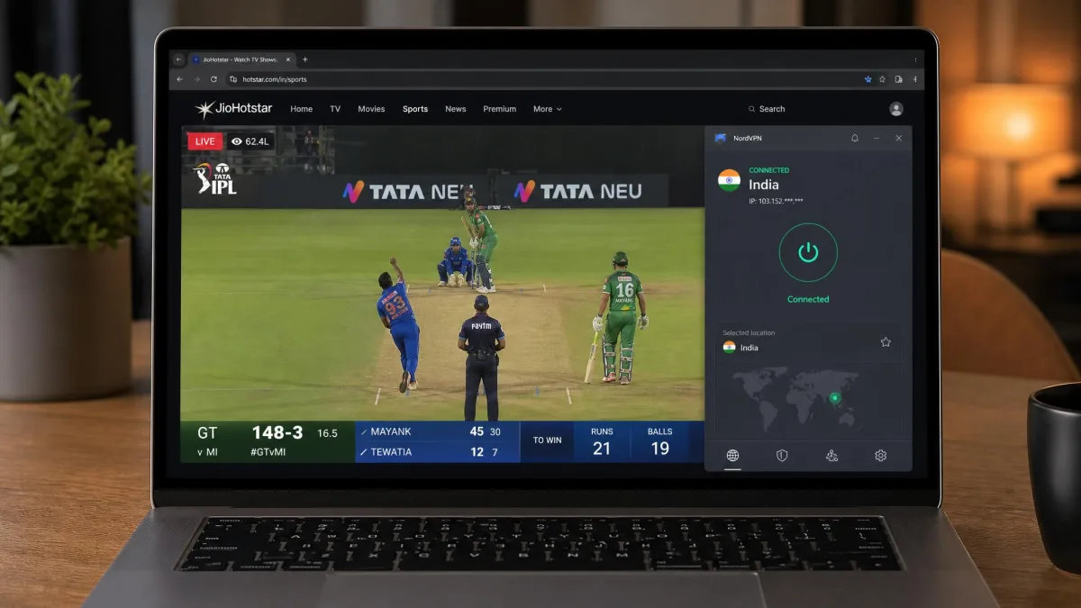 A laptop playing a live cricket match on JioHotstar, with the NordVPN app in the corner connected to the India virtual location.