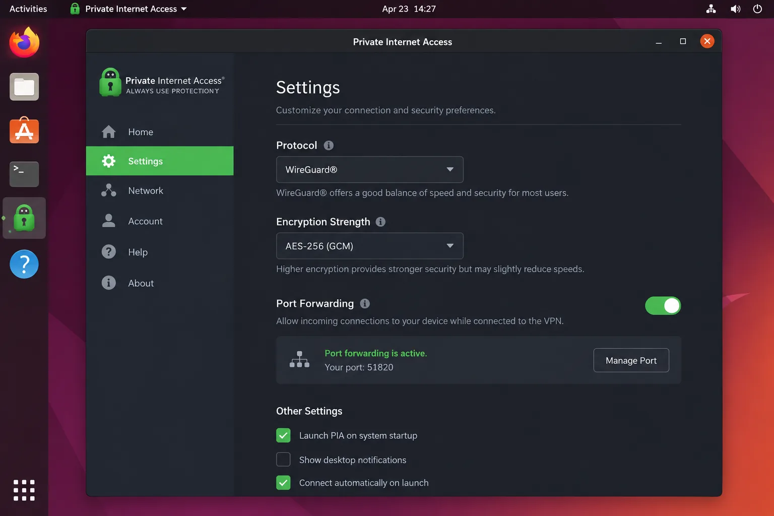 Private Internet Access's Linux desktop app on Ubuntu with the Settings panel open, showing protocol, encryption strength and port forwarding toggles.
