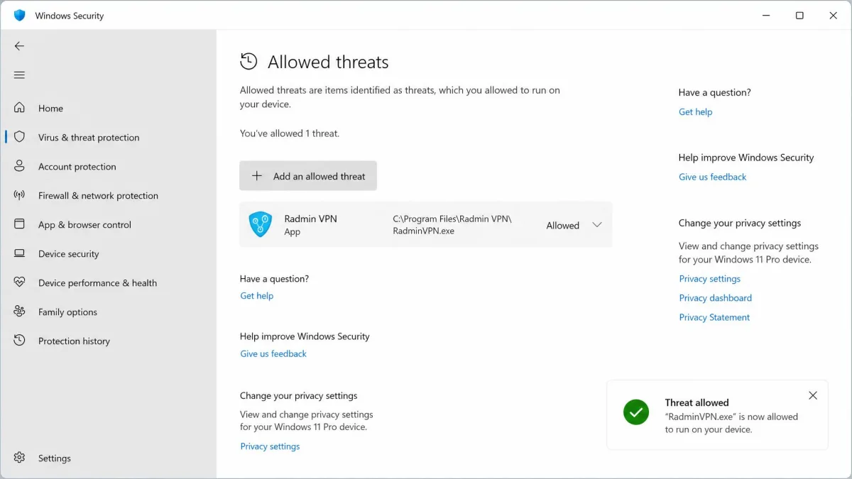 Windows Security screen showing an "Allowed threats" or exclusions list with a Radmin VPN entry being added as an exception, illustrating whitelisting the app for it to connect.