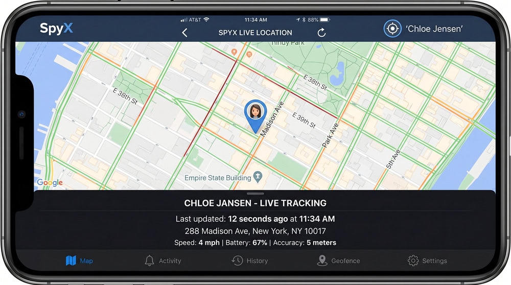 SpyX live location screen showing a pin on a city street map with a last-updated timestamp and an address readout beneath it.