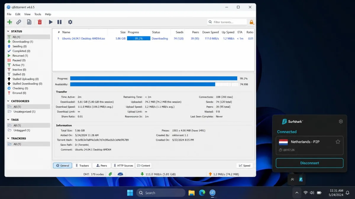 A torrent client window with a large file downloading at near-full speed while Surfshark shows a connected P2P server in the system tray during our testing.