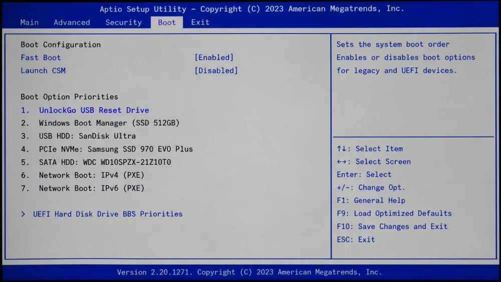 A laptop BIOS boot-menu screen with the UnlockGo USB reset drive moved to the top of the boot order, the arrow-key and F10 save prompts visible at the bottom.