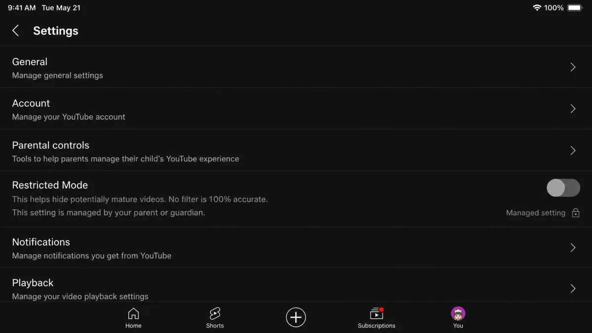 The YouTube app settings screen on a supervised child account with the Restricted Mode toggle greyed out.