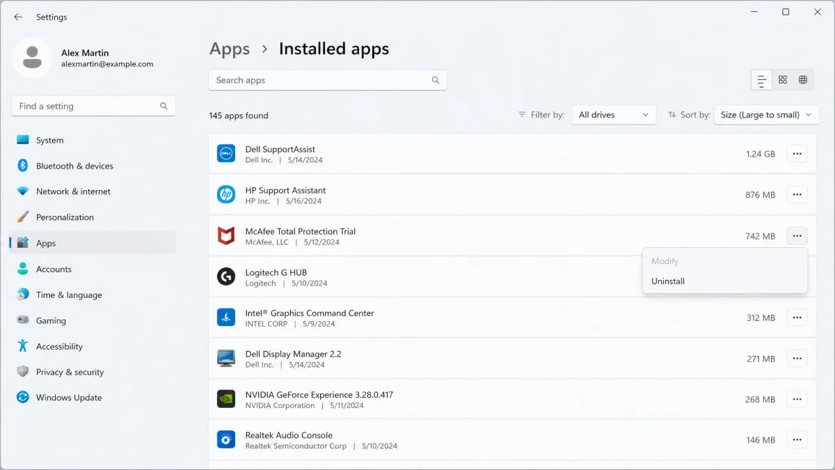 Windows 11 Settings Installed apps page sorted by size, showing manufacturer utility programs and a trial security suite with their install dates and uninstall menus.